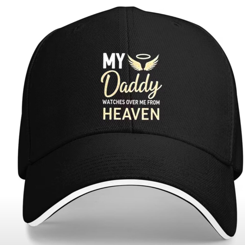 Black unsex cap with text on front and a white brim.